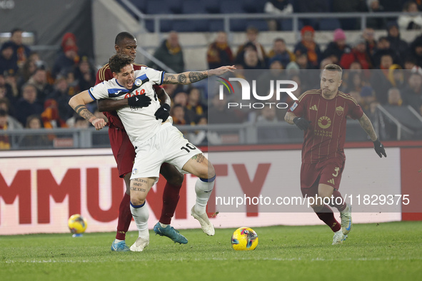 Atalanta's Nicolo Zaniolo and Roma's Evan Ndicka participate in the Serie A soccer match between AS Roma and Atalanta BC at Stadio Olimpico...