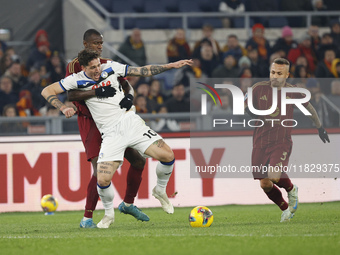 Atalanta's Nicolo Zaniolo and Roma's Evan Ndicka participate in the Serie A soccer match between AS Roma and Atalanta BC at Stadio Olimpico...