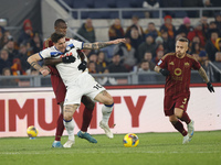 Atalanta's Nicolo Zaniolo and Roma's Evan Ndicka participate in the Serie A soccer match between AS Roma and Atalanta BC at Stadio Olimpico...