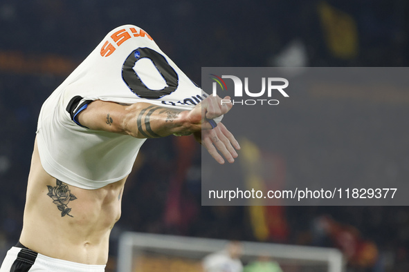 Atalanta's Nicolo Zaniolo celebrates after scoring their second goal during the Serie A soccer match between AS Roma and Atalanta BC at Stad...