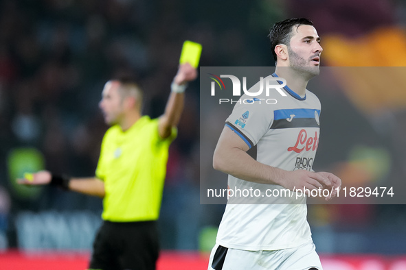 Sead Kolasinac of Atalanta BC receives a yellow card during the Serie A Enilive match between AS Roma and Atalanta BC at Stadio Olimpico on...