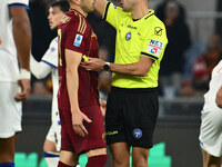 Stephan El Shaarawy of A.S. Roma and referee Marco Guida are present during the 14th day of the Serie A Championship between A.S. Roma and A...