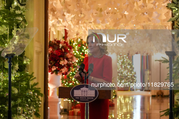 First Lady Dr. Jill Biden greets volunteers who help decorate the White House Christmas displays. Earlier in the day, she is asked if she su...