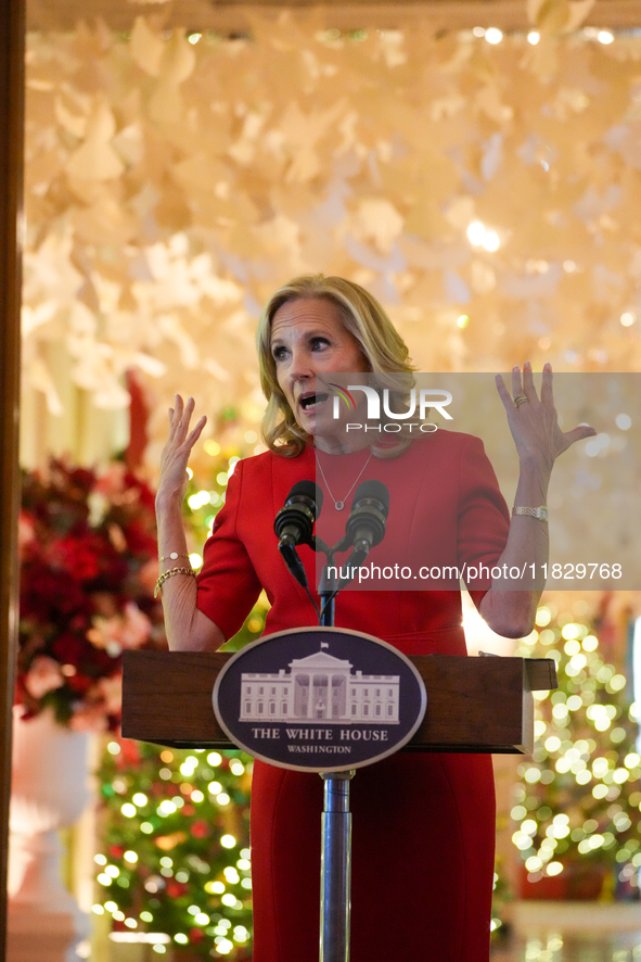 First Lady Dr. Jill Biden greets volunteers who help decorate the White House Christmas displays. Earlier in the day, she is asked if she su...