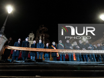 In Rome, Italy, on December 2, 2024, the tree signed Bulgari on the steps of Trinita dei Monti and the lights of Via Condotti are lit. The r...