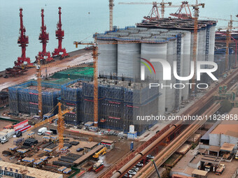 A photo taken on December 3, 2024, shows the construction site of the first phase of the project at Lianyungang International Grain Distribu...