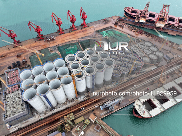 A photo taken on December 3, 2024, shows the construction site of the first phase of the project at Lianyungang International Grain Distribu...