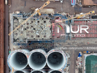 A photo taken on December 3, 2024, shows the construction site of the first phase of the project at Lianyungang International Grain Distribu...