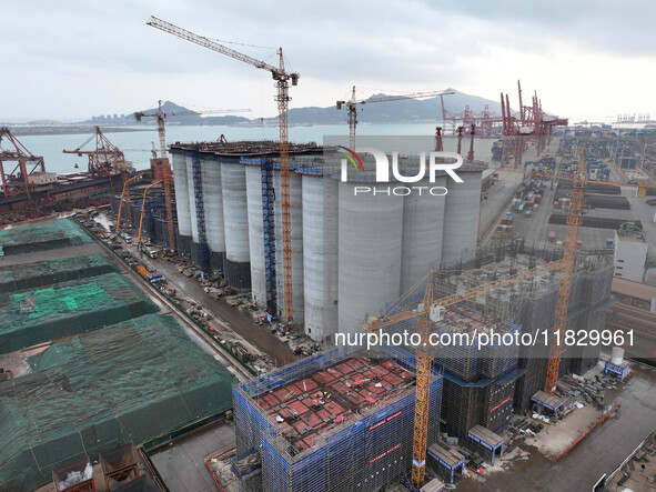 A photo taken on December 3, 2024, shows the construction site of the first phase of the project at Lianyungang International Grain Distribu...