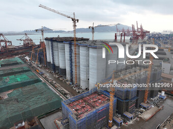 A photo taken on December 3, 2024, shows the construction site of the first phase of the project at Lianyungang International Grain Distribu...