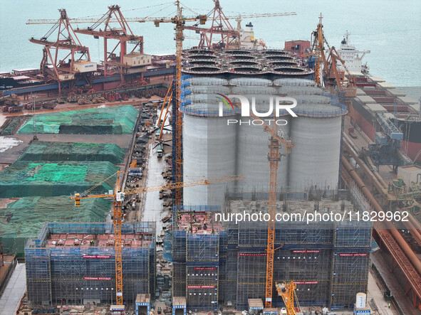 A photo taken on December 3, 2024, shows the construction site of the first phase of the project at Lianyungang International Grain Distribu...