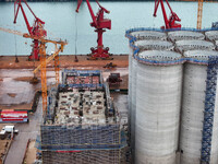 A photo taken on December 3, 2024, shows the construction site of the first phase of the project at Lianyungang International Grain Distribu...