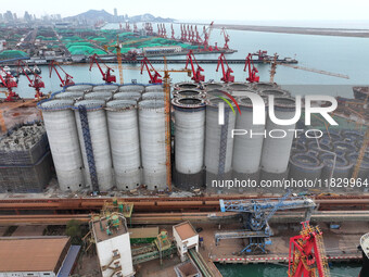 A photo taken on December 3, 2024, shows the construction site of the first phase of the project at Lianyungang International Grain Distribu...