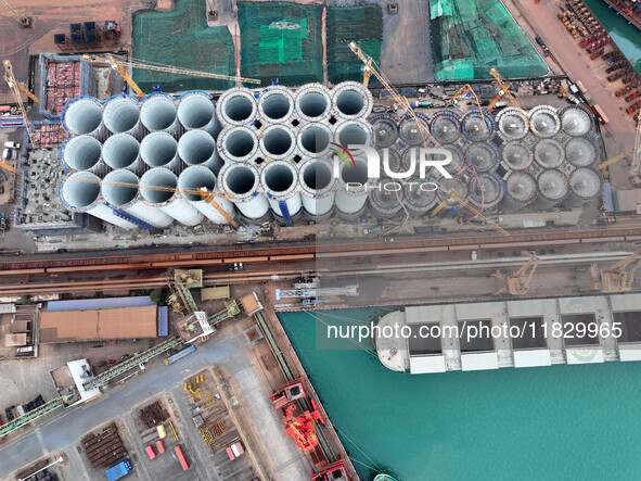 A photo taken on December 3, 2024, shows the construction site of the first phase of the project at Lianyungang International Grain Distribu...