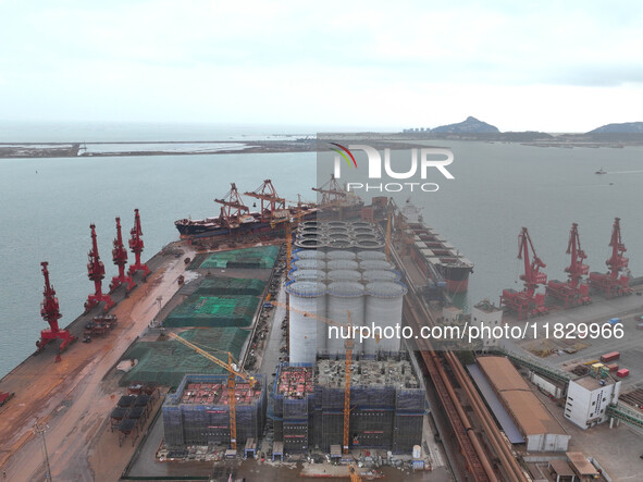 A photo taken on December 3, 2024, shows the construction site of the first phase of the project at Lianyungang International Grain Distribu...