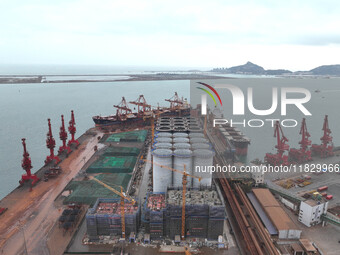 A photo taken on December 3, 2024, shows the construction site of the first phase of the project at Lianyungang International Grain Distribu...