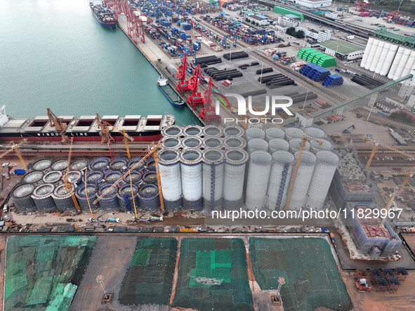 A photo taken on December 3, 2024, shows the construction site of the first phase of the project at Lianyungang International Grain Distribu...