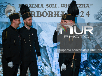 WIELICZKA, POLAND - DECEMBER 02:   
Miners chatting ahead of the arrival of the President of Poland, Andrzej Duda, for the  celebrations of...