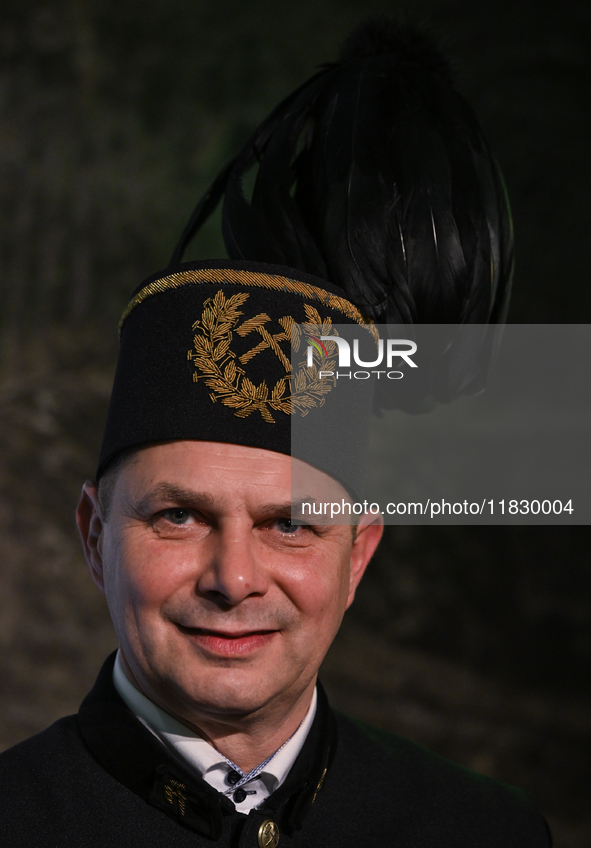 WIELICZKA, POLAND - DECEMBER 02:   
A miner wearing a traditional 'Czako,' a ceremonial mining cap, which is part of the formal mining unifo...