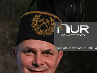 WIELICZKA, POLAND - DECEMBER 02:   
A miner wearing a traditional 'Czako,' a ceremonial mining cap, which is part of the formal mining unifo...