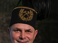 WIELICZKA, POLAND - DECEMBER 02:   
A miner wearing a traditional 'Czako,' a ceremonial mining cap, which is part of the formal mining unifo...