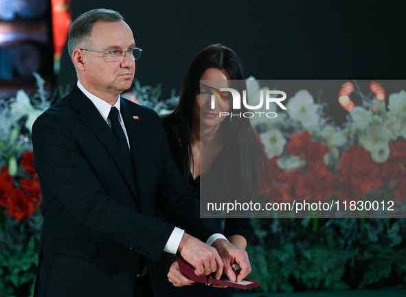 WIELICZKA, POLAND - DECEMBER 02:   
President of Poland, Andrzej Duda, decorates distinguished employees of the Wieliczka Salt Mine during t...