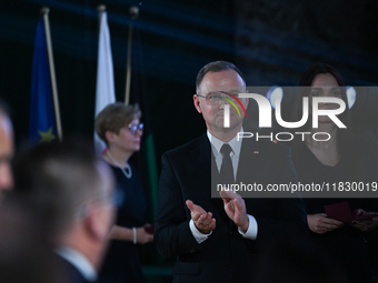 WIELICZKA, POLAND - DECEMBER 02:   
President of Poland, Andrzej Duda, decorates distinguished employees of the Wieliczka Salt Mine during t...