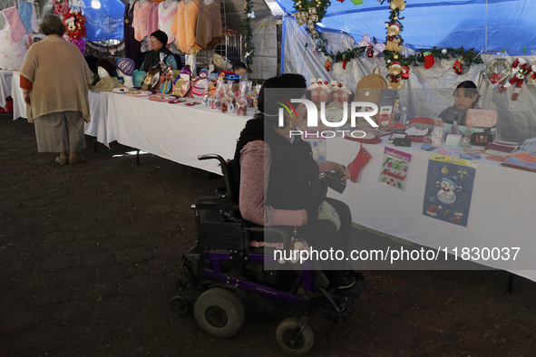 Visitors attend the Christmas Bazaar in the Tlahuac municipality in Mexico City, Mexico, on December 2, 2024, where the capital offers the s...