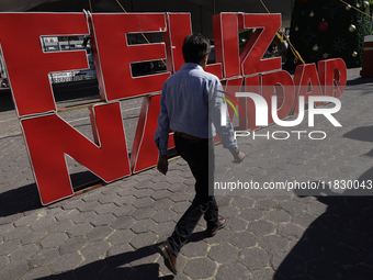 Visitors attend the Christmas Bazaar in the Tlahuac municipality in Mexico City, Mexico, on December 2, 2024, where the capital offers the s...