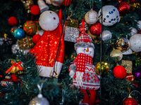 People participate in the Christmas tree lighting ceremony at the Marriott Hotel in Kathmandu, Nepal, on December 1, 2024. (