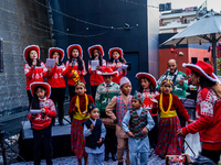 People participate in the Christmas tree lighting ceremony at the Marriott Hotel in Kathmandu, Nepal, on December 1, 2024. (