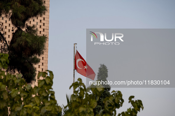 A Turkish flag waves at the Turkish embassy during a protest against Turkish President Recep Tayyip Erdogan and his diplomacy regarding rece...