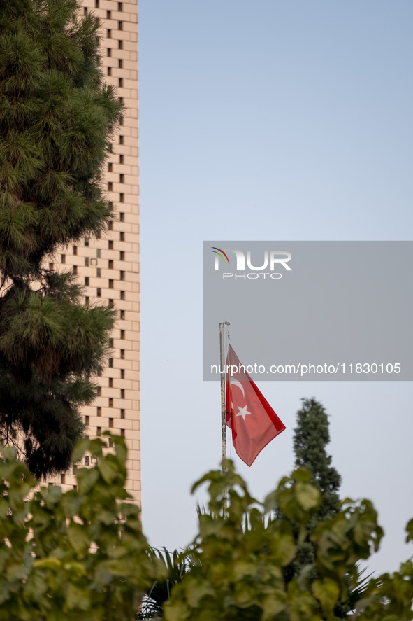 A Turkish flag waves at the Turkish embassy during a protest against Turkish President Recep Tayyip Erdogan and his diplomacy regarding rece...