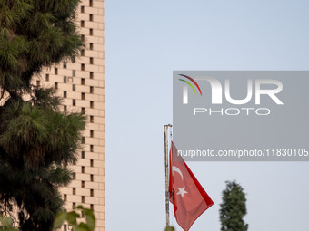 A Turkish flag waves at the Turkish embassy during a protest against Turkish President Recep Tayyip Erdogan and his diplomacy regarding rece...