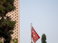 A Turkish flag waves at the Turkish embassy during a protest against Turkish President Recep Tayyip Erdogan and his diplomacy regarding rece...