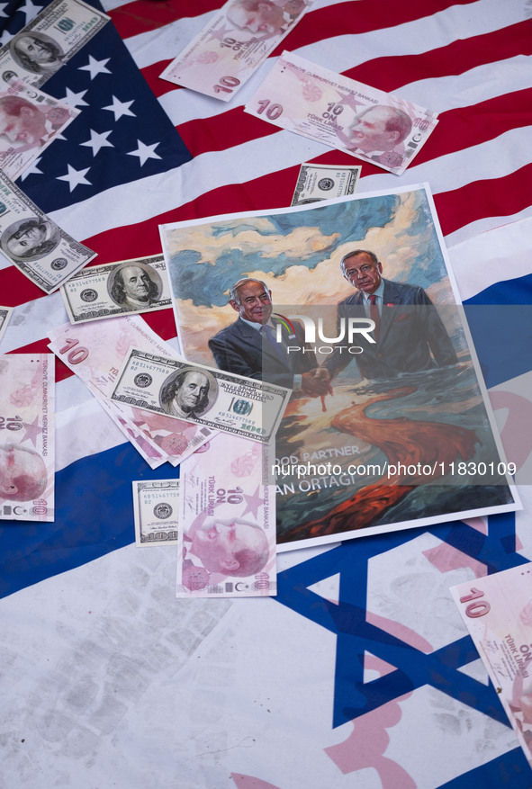 Copies of the U.S. Dollar and Turkish Lira banknotes, along with a poster featuring portraits of Turkish President Recep Tayyip Erdogan and...