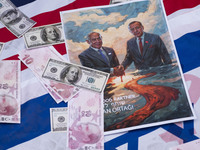 Copies of the U.S. Dollar and Turkish Lira banknotes, along with a poster featuring portraits of Turkish President Recep Tayyip Erdogan and...