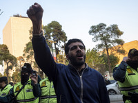 An Iranian protester shouts anti-U.S. and anti-Turkish President slogans while taking part in a protest against Turkish President Recep Tayy...