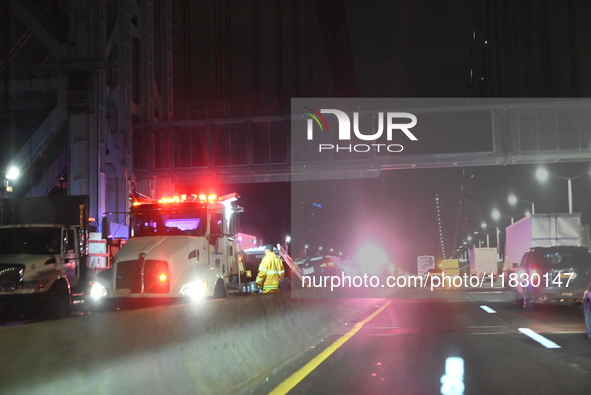 An accident with injuries and an extrication reportedly involving construction workers closes several lanes on the George Washington Bridge...