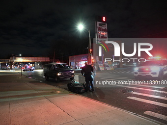 A person is struck by a van while crossing in Queens, New York, United States, on December 3, 2024. At around 12:20 a.m. on Tuesday, an indi...