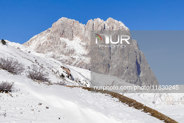 The Corno Grande peak rises above the snow-covered slopes in Campo Imperatore, Gran Sasso d'Italia, Italy, on November 16, 2024.  