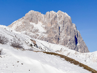 The Corno Grande peak rises above the snow-covered slopes in Campo Imperatore, Gran Sasso d'Italia, Italy, on November 16, 2024.  (