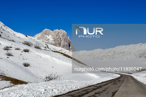 The Corno Grande peak rises above the snow-covered slopes in Campo Imperatore, Gran Sasso d'Italia, Italy, on November 16, 2024.  