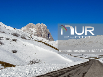 The Corno Grande peak rises above the snow-covered slopes in Campo Imperatore, Gran Sasso d'Italia, Italy, on November 16, 2024.  (