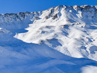 Shadows on the snow-covered slopes of the Gran Sasso massif in Campo Imperatore, Gran Sasso d'Italia, Italy, on November 16, 2024.  (