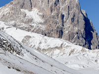 The Corno Grande peak is seen above a snow-covered road in Campo Imperatore, Gran Sasso d'Italia, Italy, on November 16, 2024.  (