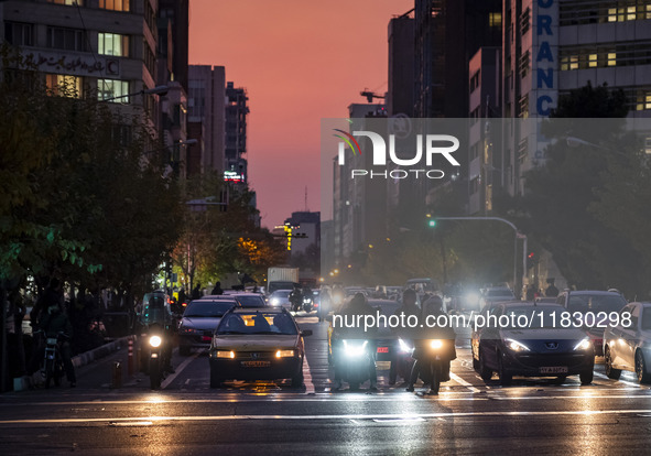 A view of a street in downtown Tehran, Iran, on December 2, 2024, at sunset. 