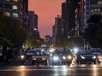 A view of a street in downtown Tehran, Iran, on December 2, 2024, at sunset. (