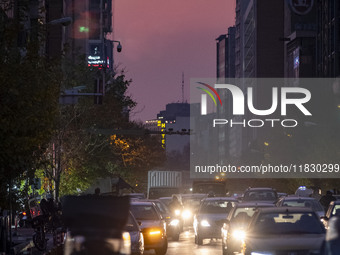 A view of a street in downtown Tehran, Iran, on December 2, 2024, at sunset. (