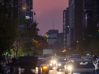 A view of a street in downtown Tehran, Iran, on December 2, 2024, at sunset. (